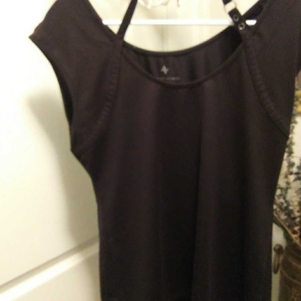 Black short sleeve Adrienne Vitiadini shirt.